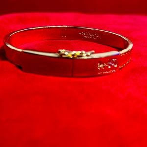 Gold-plated coach clasp bracelet